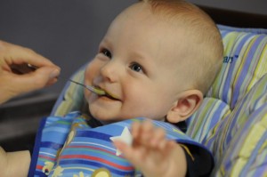 Hank enjoys green beans (notice how tidy he is when an adult helps him)