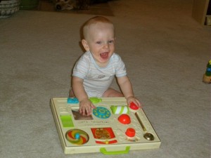 this toy belonged to Tyler when he was a baby and Hank just loves it!