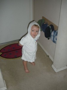 Ainsley checks out Hank's hat rack before heading to the pool