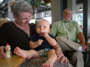 enjoying the music with Grandma and Grandpa