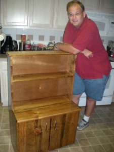 Uncle Jon and the cabinet he made for Hank